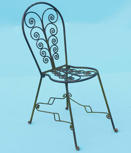 Small decorative hand forged scrolled chair