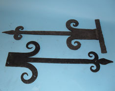 Door bracket (either real or dummy hinger) with hand forged scrolls