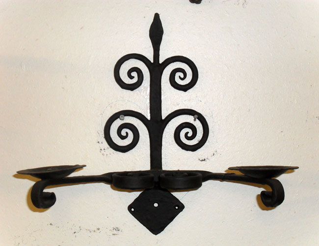 Double wall light / candle holder with hand forged scrolls and mottled forge finish