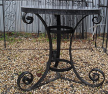 Very heavy duty round table with hand forged legs