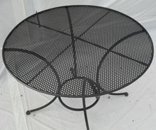 Large round table with perforated top - seats 4
