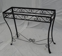 Side table hand forged scrolls and splayed feet